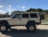 2000 Jeep Cherokee XJ on 35s, M8000 winch, locked, 4.88s - 11