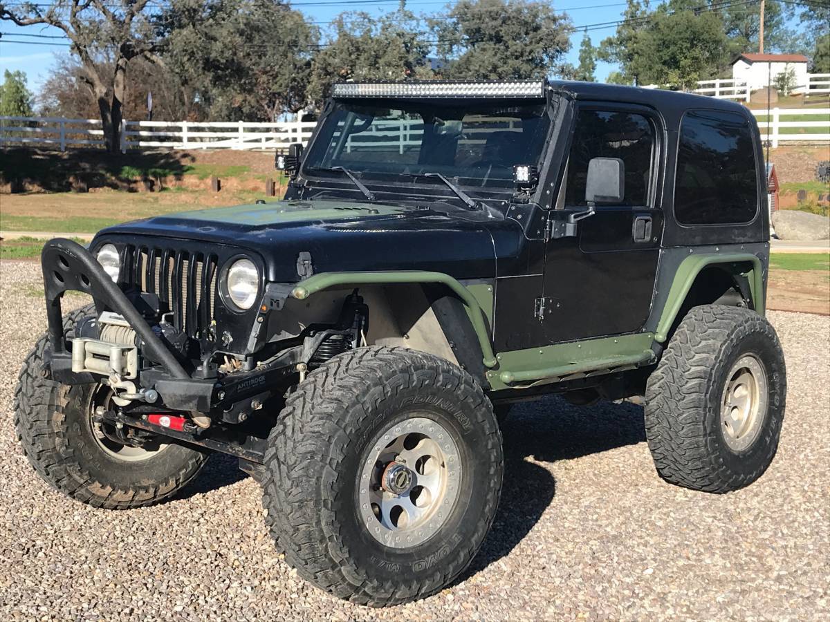 2000 Jeep Wrangler TJ, 1 tons and 37s BuiltRigs